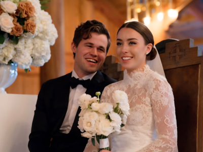 Magnus Carlsen celebrates record rating with wife.