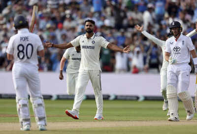 Akash Deep celebrates after taking a wicket during the Test match.