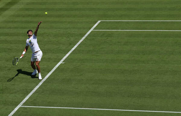 Carlos Alcaraz practicing at Wimbledon 2025